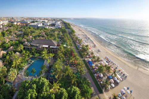 an aerial view of a resort and the beach at Legian Beach Hotel in Legian