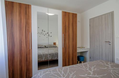 A bed or beds in a room at Apartment Pula R&D