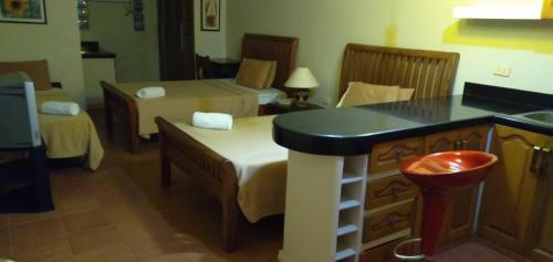 Kuchyň nebo kuchyňský kout v ubytování Happy Ripples Beach Resort