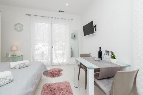 TV a/nebo společenská místnost v ubytování Apartments D&A