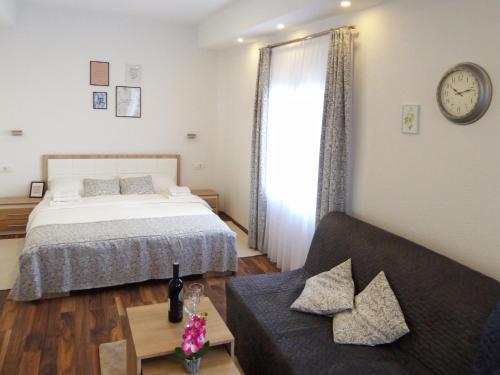 En eller flere senge i et værelse på Apartment Petra i Nikola