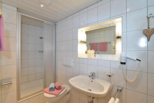 Ванна кімната в Gästehaus Maxheim