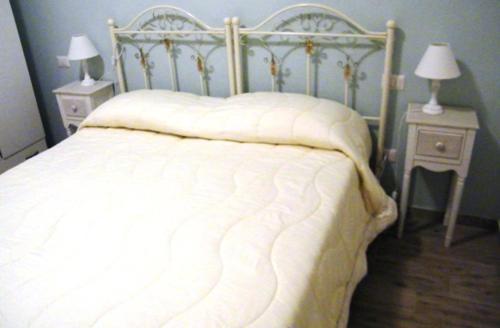 Postel nebo postele na pokoji v ubytování B&B Il Cantuccio