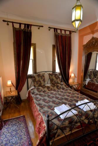 Letto o letti in una camera di Santa Marina Guesthouse
