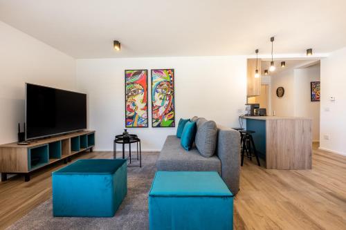 TV a/nebo společenská místnost v ubytování Tamara Luxury Apartments