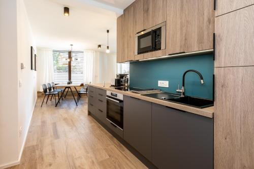 Kuchyň nebo kuchyňský kout v ubytování Tamara Luxury Apartments