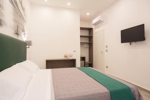 Postel nebo postele na pokoji v ubytování B&B Toledo one