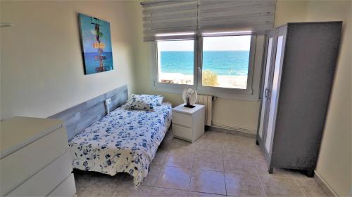 Posteľ alebo postele v izbe v ubytovaní MARILU SEAVIEW & BEACH - apartment