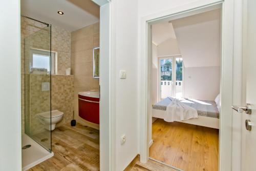 Ванна кімната в Apartments Bubalo