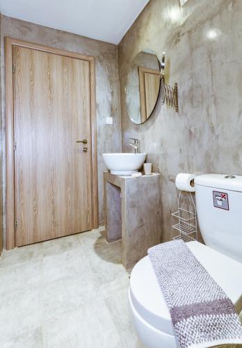 Ένα μπάνιο στο Gregory Comfort Hotel