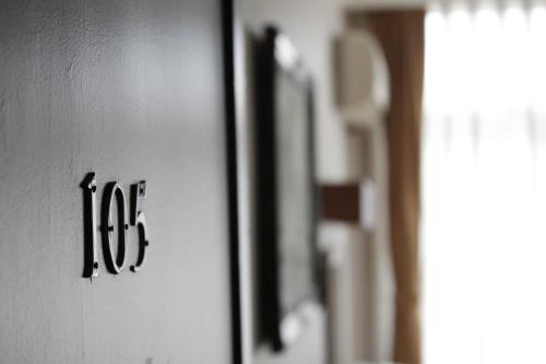 a close up of a door with the text job on it at Saban Acikgoz Hotel in Edirne