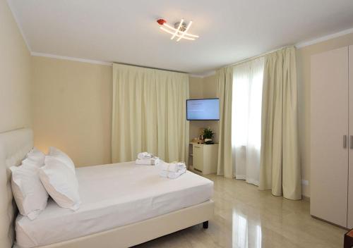 Letto o letti in una camera di Agriturismo Il Colle