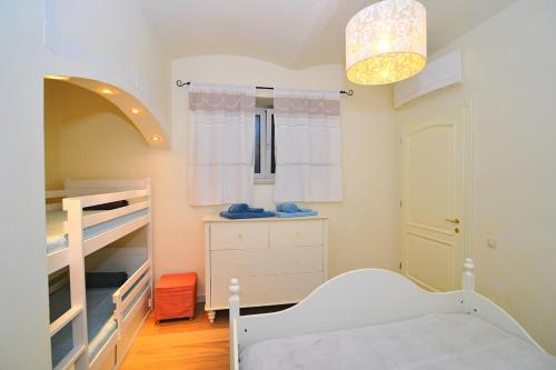 Ένα ή περισσότερα κρεβάτια σε δωμάτιο στο Luxury Apartment Mare