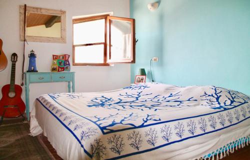 Postel nebo postele na pokoji v ubytování Casa Gnigni
