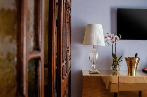 Et tv og/eller underholdning på Palazzo dei Grifoni - Luxury Suites -