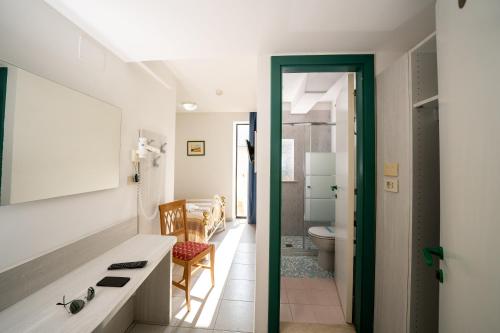 a bathroom with a sink and a toilet at Hotel Florida in Silvi Marina