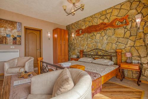 Postel nebo postele na pokoji v ubytování Apartments Tati