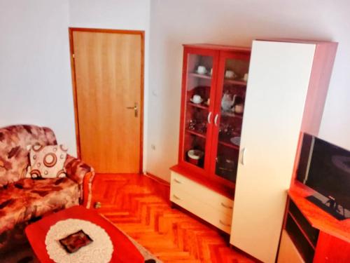 TV a/nebo společenská místnost v ubytování Apartment Tičić
