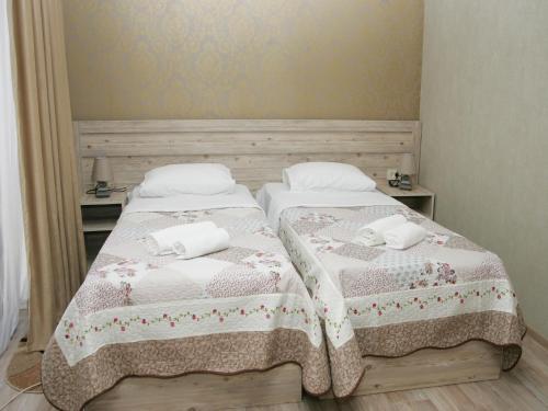 Hotel Tskhumiにあるベッド