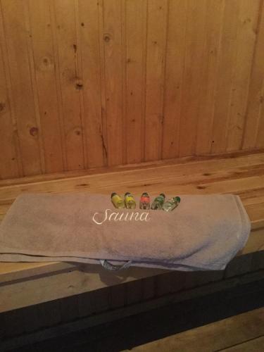 a towel with the words sambil on it in a sauna at Hideaway Extertal in Extertal