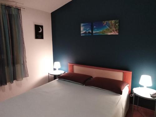 Ένα ή περισσότερα κρεβάτια σε δωμάτιο στο Apartment Gogo