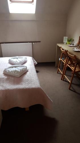 Postel nebo postele na pokoji v ubytování BI&BI