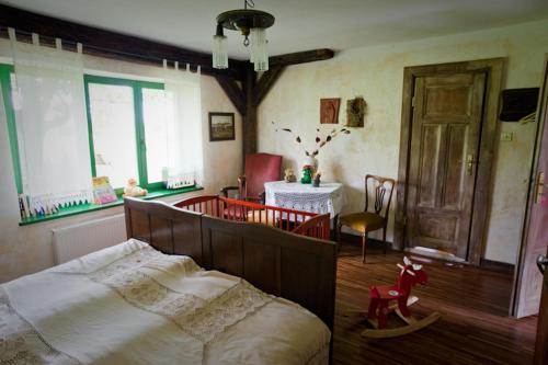 Postel nebo postele na pokoji v ubytování Domy Konesera