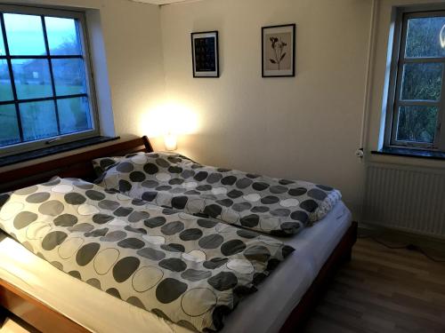 Postel nebo postele na pokoji v ubytování Genner Bygade 18 Feriehus