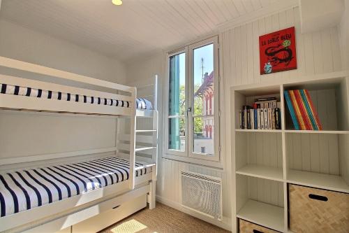 Postel nebo postele na pokoji v ubytování La Favorite