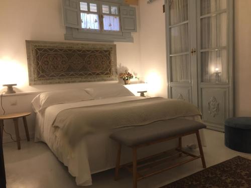 En eller flere senge i et værelse på Villa Inocencia