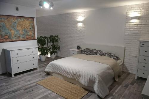 En eller flere senge i et værelse på Apartament Loft 100 m2 Centrum Bydgoszcz