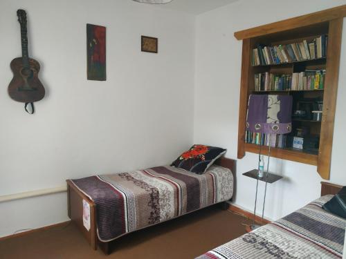 En eller flere senge i et værelse på Villa Valentina Issyk-Kul