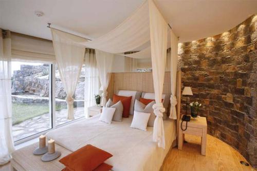 Postel nebo postele na pokoji v ubytování Villa Atlantis