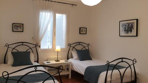 Ένα ή περισσότερα κρεβάτια σε δωμάτιο στο Les Lavandes