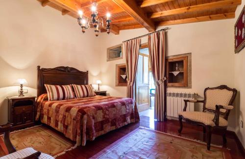 מיטה או מיטות בחדר ב-Casa de Marcelo
