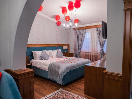 Postel nebo postele na pokoji v ubytování PalmaNova Resort