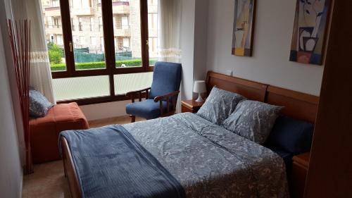 Un ou plusieurs lits dans un hébergement de l'établissement Apartamento Turístico Los Altos