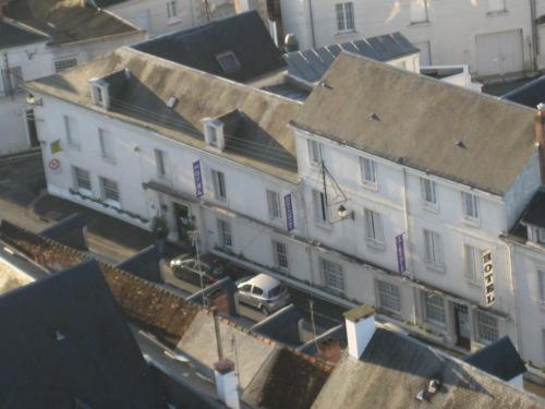 an overhead view of a building with a car in a city at La Tete Noire in Montrichard