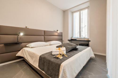 Posteľ alebo postele v izbe v ubytovaní Benso Rooms