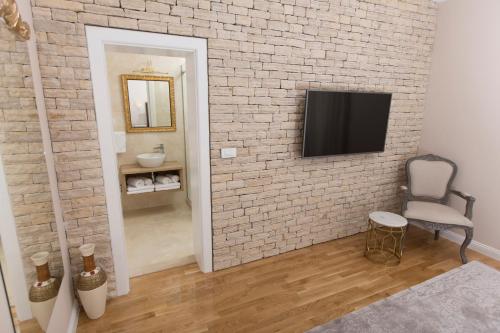 TV a/nebo společenská místnost v ubytování San Mihael luxury rooms 1