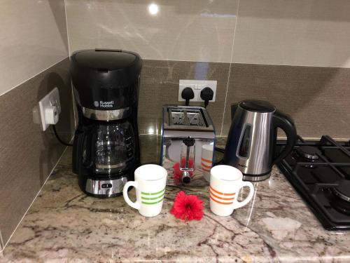 Kemudahan buat kopi dan teh di Whispering Palms