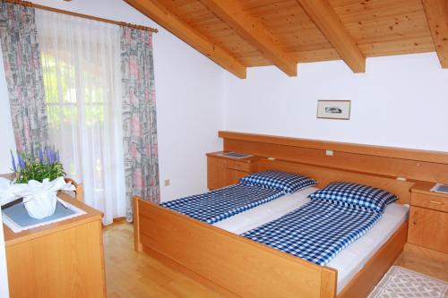 Postel nebo postele na pokoji v ubytování Fixlhof