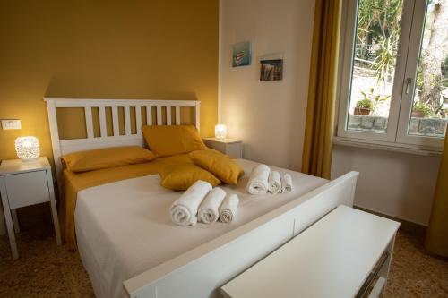 Posteľ alebo postele v izbe v ubytovaní Villa Aurora Mondello Addaura