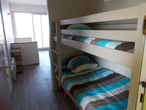 Krevet ili kreveti na sprat u jedinici u okviru objekta Appartement fort bloqué