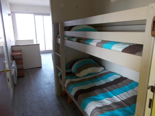 Ένα ή περισσότερα κρεβάτια σε δωμάτιο στο Appartement fort bloqué
