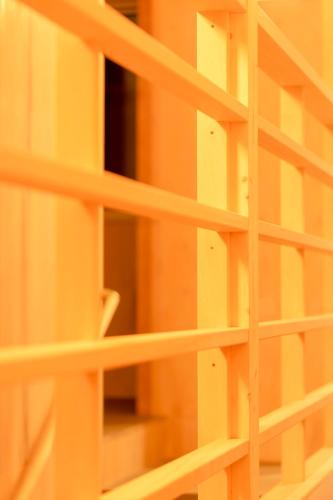 a close up of a shelf in a building at BEACH AND FIELD INN in Sapporo