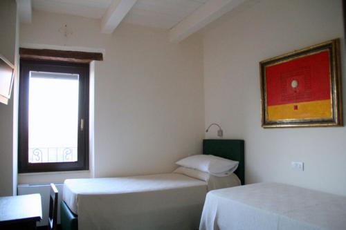 Letto o letti in una camera di La tana dei leoni