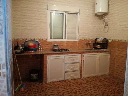 Kuchyň nebo kuchyňský kout v ubytování Appartement belle vue