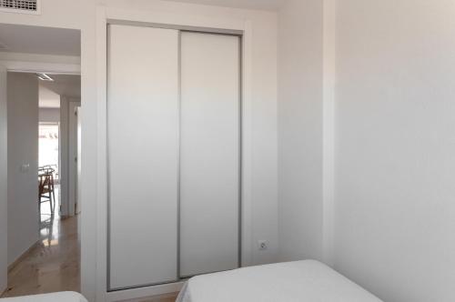 Katil atau katil-katil dalam bilik di Calmo Singular Apartments