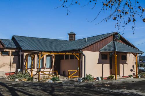a house under construction with a roof at Sztár Motel Étterem in Balassagyarmat